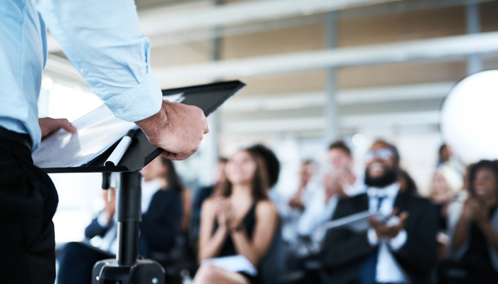 Closeup Business Man With Crowd Presentation Conference With Information Motivation Event Zoom Male Person Staff Workshop Speaker Presenter With Ideas Audience